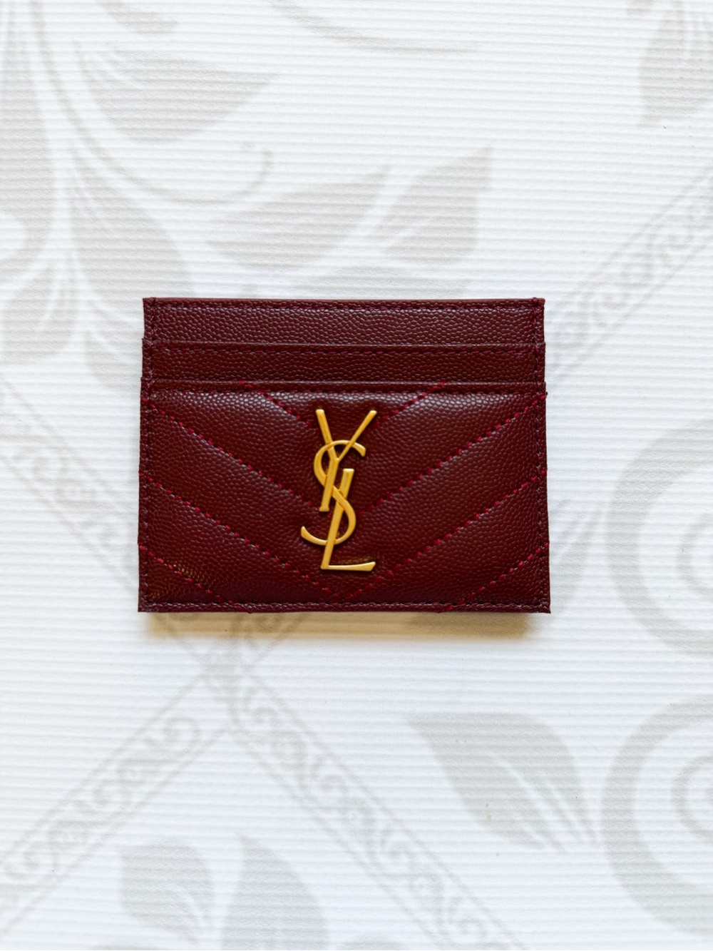 Saint Laurent Cassandre Card Case in Rouge Cabernet Calfskin Gold YSL Logo